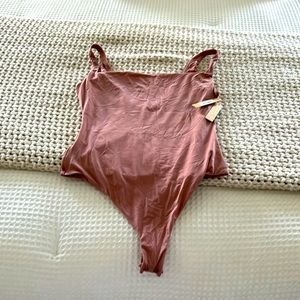 Brand new with tags skims size medium body suit